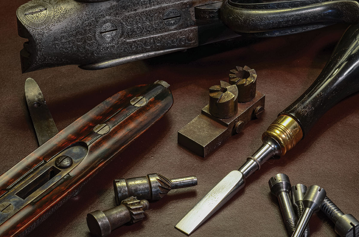 James Woodward & Sons double rifle made around 1878. Note the pins in the forend, beautifully timed and sculpted to blend with the surrounding wood. The tools are almost as old as the rifle itself – artifacts of a late, lamented age.